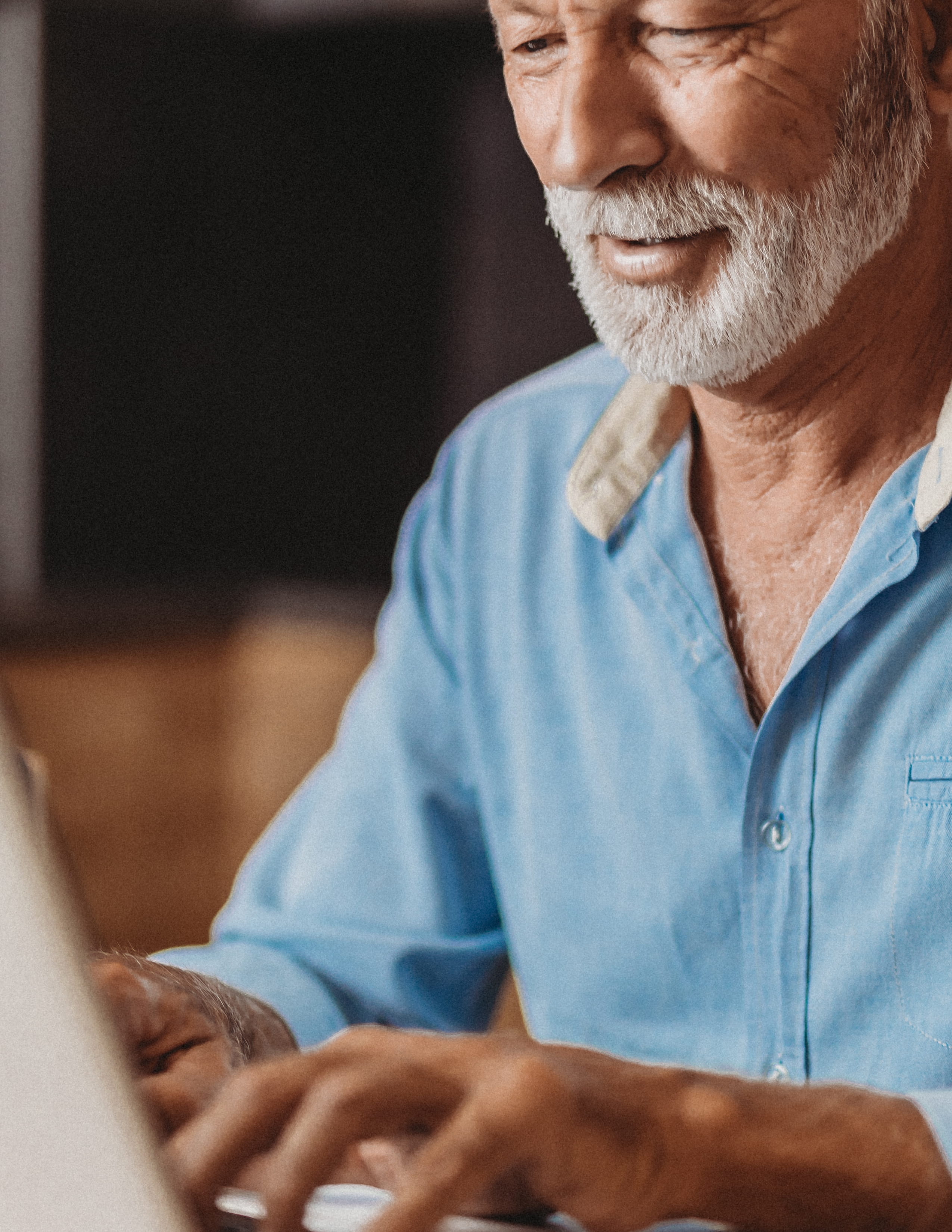 Man typing on laptop